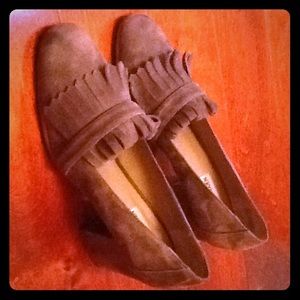 Gray suede pumps with a front flap